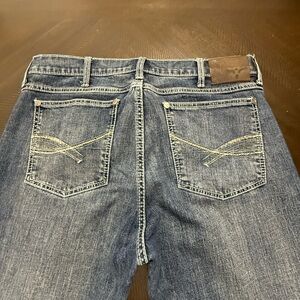Wrangler 20X Men's Blue Denim Jeans with Back Pocket Stitching